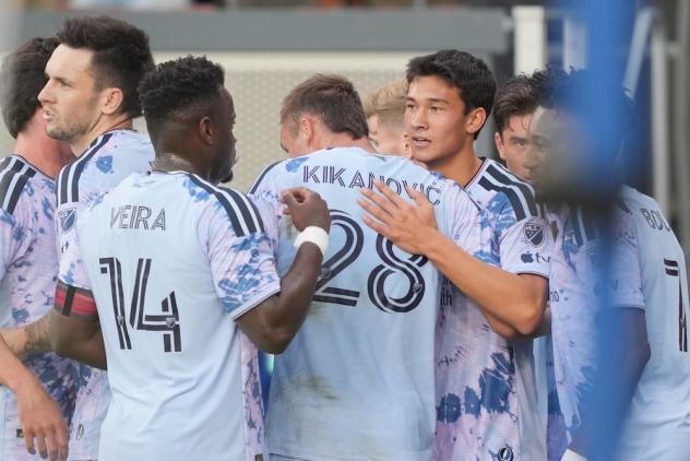 San Jose Earthquakes exchange congratulations after a goal against Minnesota United FC