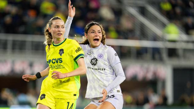 Racing Louisville FC forward Emma Sears (right) vs. the Washington Spirit