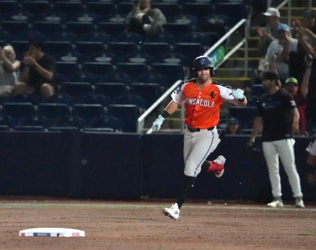 Brendan Jones of the Pensacola Blue Wahoos rounds the bases