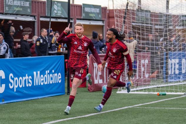 Detroit City FC forward Connor Rutz (left) and defender Rio Hope-Gund