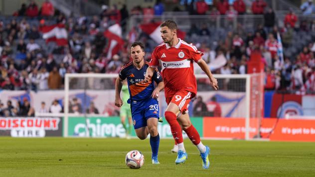 FC Cincinnati's Pavel Bucha and Chicago Fire FC's Hugo Cuypers in action