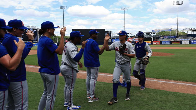 St. Lucie Mets exchange high fives at Tampa