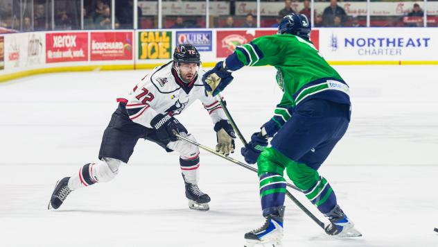 Adirondack Thunder forward Alex Campbell (left) vs. the Maine Mariners