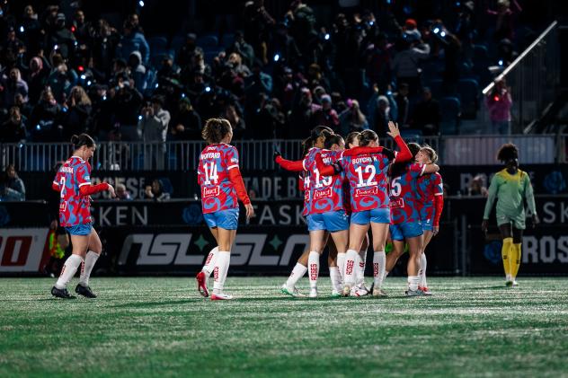 Montreal Roses celebrate a goal