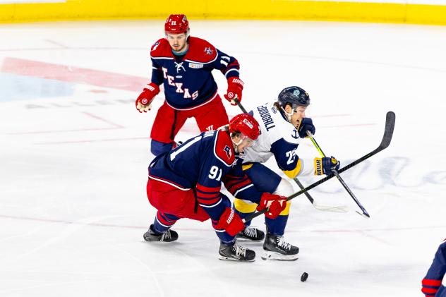 Allen Americans battle for the puck