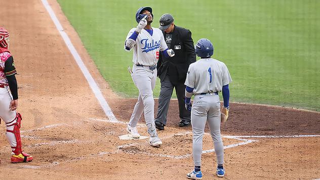 Josue De Paula of the Tulsa Drillers crosses home plate