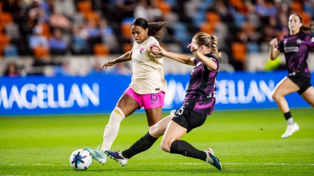 San Diego Wave FC forward Trinity Byars (left) vs. the Houston Dash