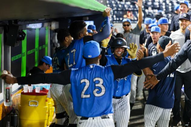 Tampa Tarpons celebrate Ediel Rivera's home run