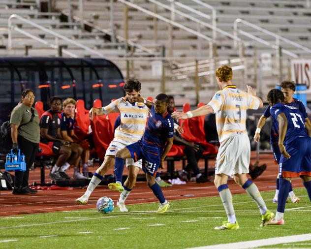Corpus Christi Sharks defender Shannon Gomez (22) fights for the ball