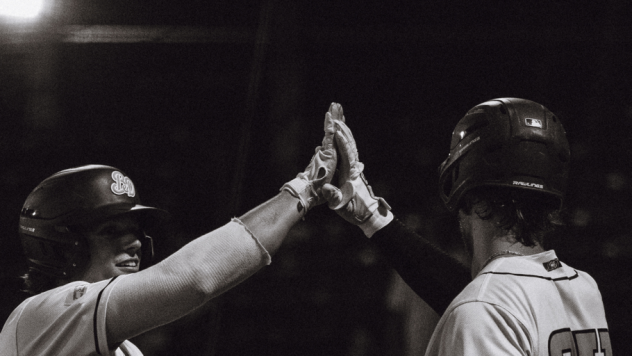 Down East Bird Dawgs exchange high fives