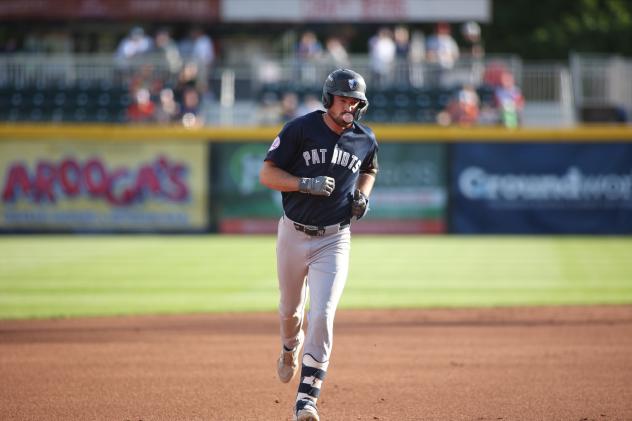 Garrett Martin of the Somerset Patriots rounds the bases