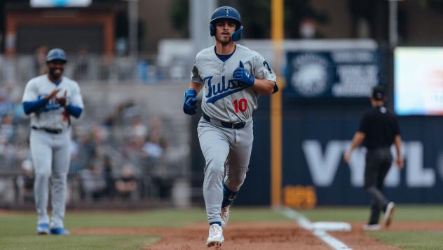 Taylor Young of the Tulsa Drillers rounds the bases
