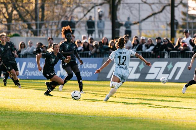 AFC Toronto midfielder Zoe Burns (right)