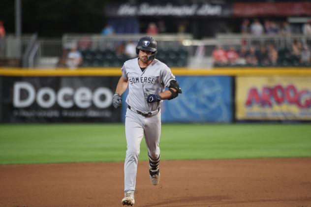 Garrett Martin of the Somerset Patriots rounds the bases