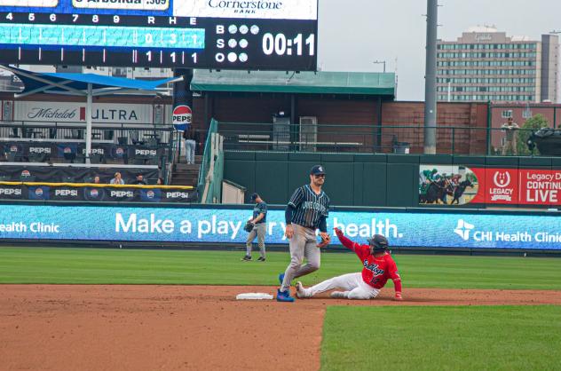 Lincoln Saltdogs infielder Paul Myro slides into second