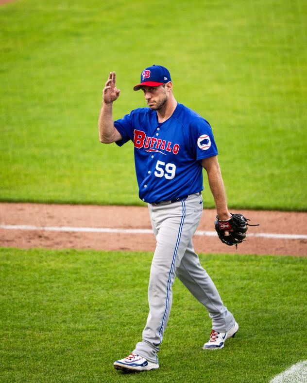 Buffalo Bisons pitcher Max Scherzer acknowledges the crowd at Polar Park