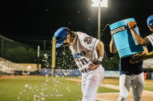 Biloxi Shuckers shortstop Dylan O'Rae gets a shower