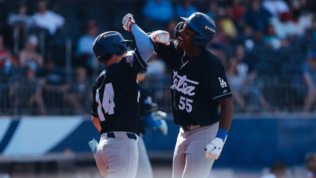 Josue De Paula of the Tulsa Drillers celebrates after his two-run homer