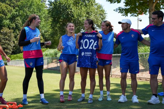 North Carolina Courage teammates and staff cheer Ivy Younce