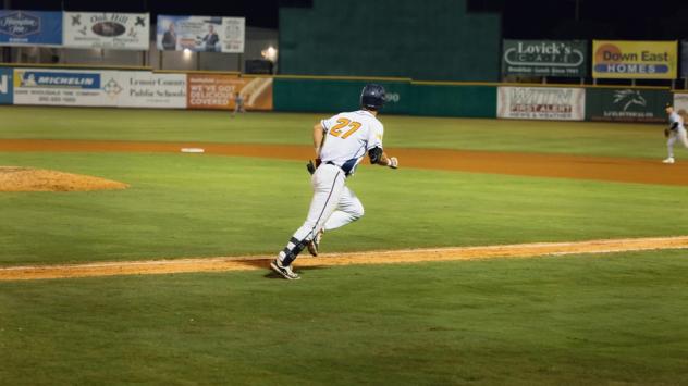 Down East Bird Dawgs utility player Christian Adams heads to first