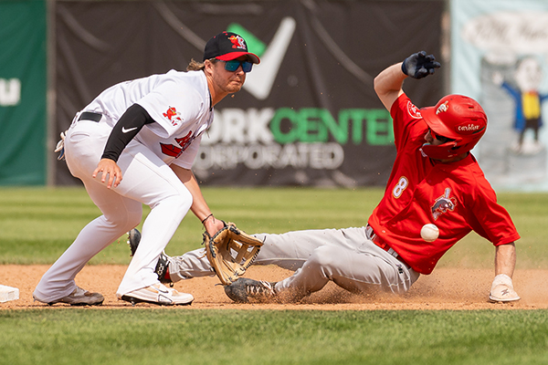 Adam Hall of the Winnipeg Goldeyes slides into second