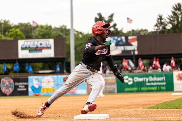 Austin Davis of the Sioux City Explorers rounds third base