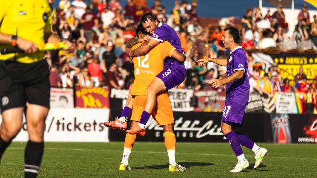 Louisville City FC goalkeeper Danny Faundez and defender Jake Morris