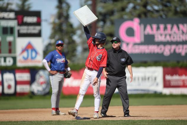 Tanner Recchio of the St. Cloud Rox celebrates his Northwoods League stolen base record
