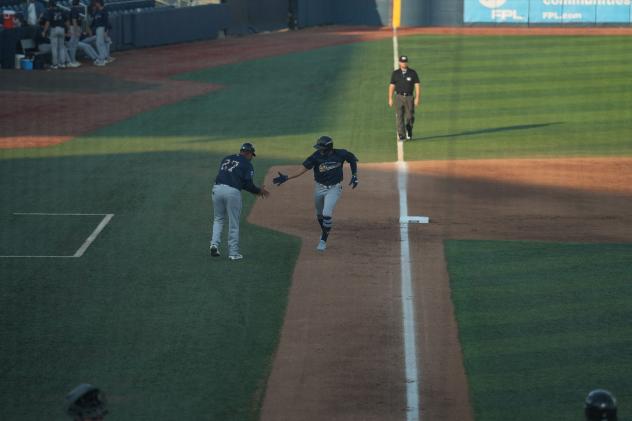Jadher Areinamo of the Montgomery Biscuits heads home