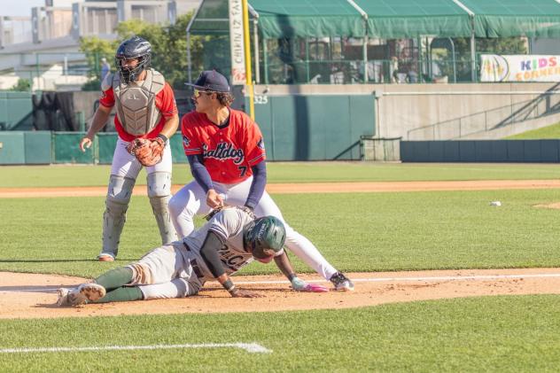 Lincoln Saltdogs apply a tag at home against the Gary SouthShore RailCats