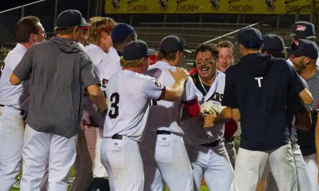 Alberto Osuna and the Sioux City Explorers celebrate their walk off win