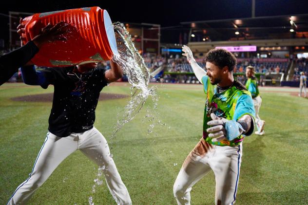 Cristian Hernández gets the Gatorade treatment from the Pensacola Blue Wahoos