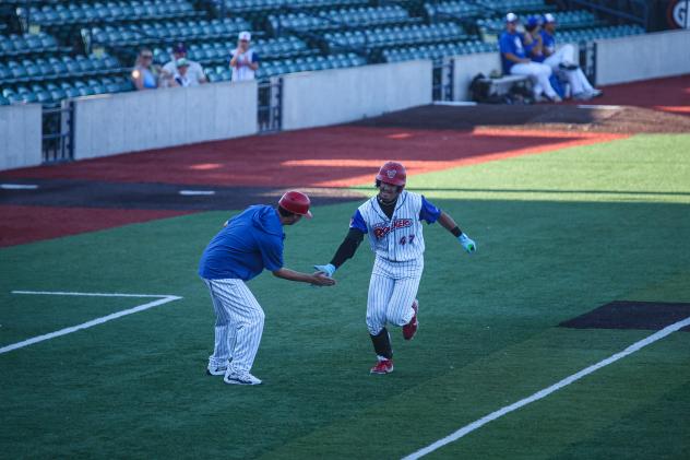 Green Bay Rockers first baseman Aidan Kuni heads home