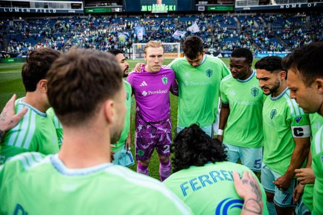 Sounders FC huddle
