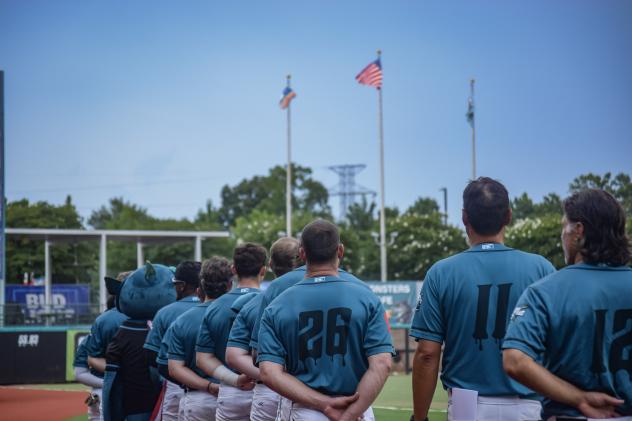 Mississippi Mud Monsters stand for the National Anthem