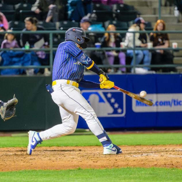 Tri-City Dust Devils with a big swing Friday night