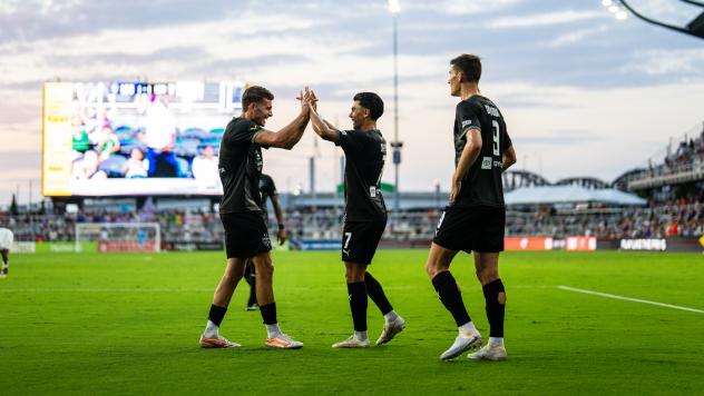 Louisville City FC exchange high fives