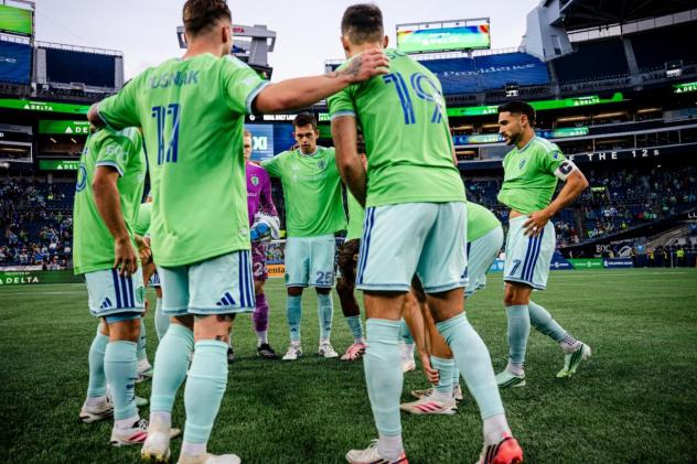 Sounders FC huddle