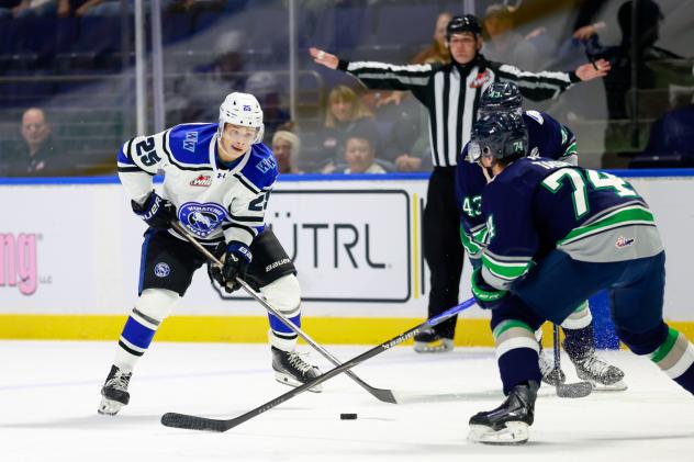 Wenatchee Wild's Grady Wedman battles Seattle Thunderbirds' Grayson Tash