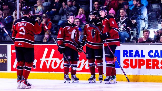 Red Deer Rebels gather following a goal
