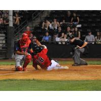 Luke Tendler of the Hickory Crawdads Slides Home