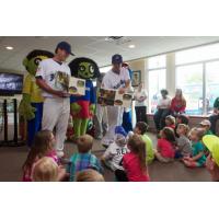 Blue Wahoos Read to Children