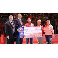 Colorado Eagles, Pedersen Toyota Ft. Collins Present Check to UCHealth Cancer Center