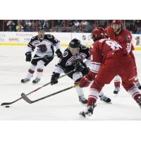 Konrad Abeltshauser of the Allen Americans Defends against the Rapid City Rush