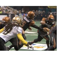 Arizona Rattlers Quarterback BJ Coleman Hands off the Ball vs. the Las Vegas Outlaws