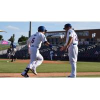 Calin Walsh of the Midland RockHounds is Congratulated after a Home Run
