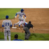 Bryce Massanari of the Ottawa Champions Takes a Blow to the Head