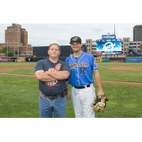 Christopher Lee of C. Lee Services with Akron RubberDucks' Jeremy Lucas
