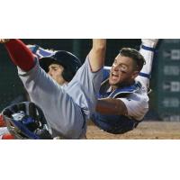 Buffalo Bisons Catcher Sean Ochinko's Attempts to Tag out Ricky Hague of the Syracuse Chiefs