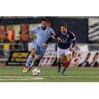 Minnesota United's Ibson Battles Dylan Mares of Indy Eleven